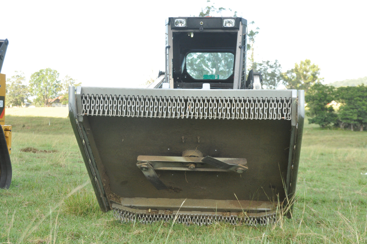 Slasher for Skid Steer Loaders: slasher on a skid steer in grass (4288x2848)