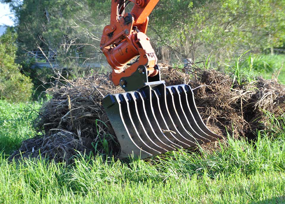 Stick Rakes for Excavators: stick rake on an excavator